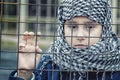 A refugee girl from the east in a headscarf Royalty Free Stock Photo