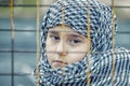 A refugee girl from the east in a headscarf Royalty Free Stock Photo