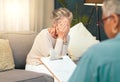 Crying, sad or old woman in counseling with a psychologist for depression, burnout or mental health problems. Checklist Royalty Free Stock Photo