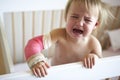 Crying Toddler With Arm In Cast