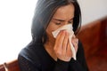 Crying woman blowing nose with wipe at funeral day Royalty Free Stock Photo