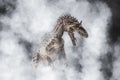 Cryolophosaurus , Dinosaur on smoke background