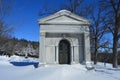 Crypt in Snow Covered Cemetery