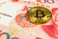 Crypto currency concept - A Bitcoin with Chinece currency RMB, Renminbi, yuan