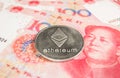 Crypto currency concept - Ethereum coin with Chinece currency RMB, Renminbi, yuan