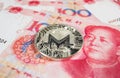 Crypto currency concept - A Monero coin with Chinece currency RMB, Renminbi, yuan