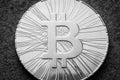 Cryptocurrency bitcoin coin. White and black macro view Royalty Free Stock Photo