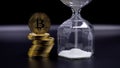 Cryptocurrency bitcoin. Hourglass that marks the right time to buy Bitcoin