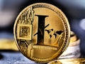 Cryptocurrency business concept. Close up of gold altcoin in hand. World cryptocurrency business. Modern blockchain technology. In