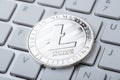 Cryptocurrency coin - Litecoin close up on the computer keyboard Royalty Free Stock Photo