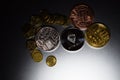 Cryptocurrency coins Ethereum and Bitcoin on a gray dark background