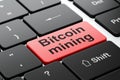 Cryptocurrency concept: Bitcoin Mining on computer keyboard background Royalty Free Stock Photo