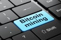 Cryptocurrency concept: Bitcoin Mining on computer keyboard background Royalty Free Stock Photo
