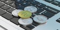 Cryptocurrency. Golden bitcoin and variety of silver virtual coins on a laptop. 3d illustration