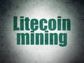 Cryptocurrency concept: Litecoin Mining on Digital Data Paper background Royalty Free Stock Photo