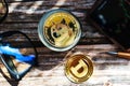 Cryptocurrency dogecoin in close-up on wooden background with sunbeams, bright sunny day