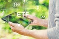 Cryptocurrency ETF theme concept with man holding his tablet