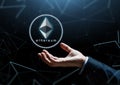 Businessman hand with ethereum over low poly