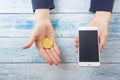 Cryptocurrency golden bitcoin coin. Hand holding symbol of crypto currency - electronic virtual money for web banking Royalty Free Stock Photo