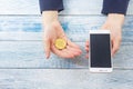 Cryptocurrency golden bitcoin coin. Hand holding symbol of crypto currency - electronic virtual money for web banking Royalty Free Stock Photo