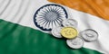 Cryptocurrency in India. Golden bitcoin and variety of silver virtual coins on India flag background. 3d illustration