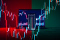 Cryptocurrency market, green and red candles pointing to buy or sell