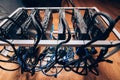 Cryptocurrency mining rig. details of graphics card mining rig with power supply Royalty Free Stock Photo