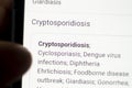 Cryptosporidiosis News on the phone.Mobile phone in hands. selective focus and chromatic aberration effects