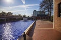 the crypts of Martin Luther King and Coretta Scott King surrounded by a pool of rippling water with blue tile