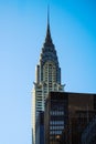 Crysler building New York Manhattan blue sky skyscraper peak Royalty Free Stock Photo