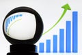 Crystal ball and ascending or descending chart Royalty Free Stock Photo