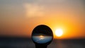 Clear Crystal Sphere Reflecting Sunrise