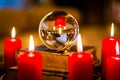 Crystal ball in the candle light to prophesy Royalty Free Stock Photo