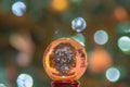 Crystal ball globe with christmas tree up side down