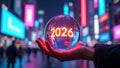 Crystal Ball with 2026 Glowing Numbers Held in Hand Foreshadowing the Future Royalty Free Stock Photo