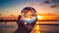 Crystal ball in the hands of a man against the background of the sunset, Generative AI illustrations Royalty Free Stock Photo