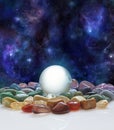 Crystal ball, healing crystals and the Universe Royalty Free Stock Photo