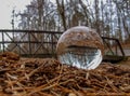 A Crystal Ball Inverts Image of Footbridge Royalty Free Stock Photo