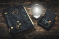Crystal ball and magic book. Royalty Free Stock Photo
