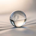A crystal ball rests on a smooth surface, reflecting a window Royalty Free Stock Photo