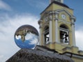 Crystal ball (Spherical lens) and view of the Transfiguration Cathedral. Vyborg Royalty Free Stock Photo