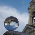 Crystal ball (Spherical lens) and view of the Transfiguration Cathedral. Vyborg Royalty Free Stock Photo