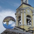 Crystal ball (Spherical lens) and view of the Transfiguration Cathedral. Vyborg Royalty Free Stock Photo