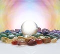 Crystal ball surrounded by healing crystals Royalty Free Stock Photo
