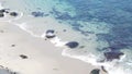 Crystal blue azure transparent ocean, California coast. Turquoise water surface.