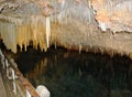 The crystal caves of Bermuda. Incredible formations of white stalactites covered with crystallized soda straws. Royalty Free Stock Photo