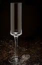 Crystal champagne flute on marble.