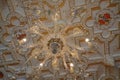 Crystal chandelier and decorated ceiling