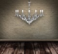 Crystal chandelier in a grungy room Royalty Free Stock Photo