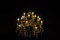 Crystal chandelier lighting in the big majestic hall Royalty Free Stock Photo